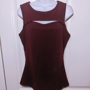 Burgundy sleeveless top with horizontal front slit
